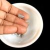 OXIBEADS0020- 50 GM PACK OF FISH MOTIF GERMAN SILVER METAL BEADS