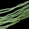 CRYSTAL0051	- 1 STRAND 4MM PARROT GREEN OPAQUE CUT CRYSTAL BEADS