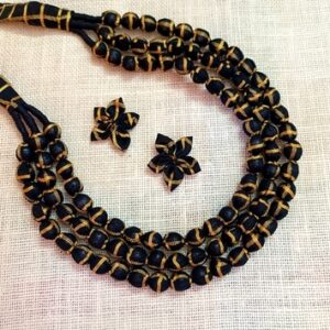 3LDORI53- ARNAS 1 PC PACK OF THREE LAYER FABRIC AND BEADS PRINTED BLACK AND ANTIQUE GOLD TASSEL WITH 2PCS FABRIC FLOWER