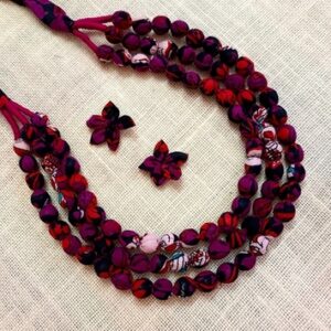 3LDORI54- ARNAS 1 PC PACK OF THREE LAYER FABRIC AND BEADS PRINTED RICH WINE RED PALETTE WITH DEEP MAGENTA UNDERTONES TASSEL WITH 2PCS FABRIC FLOWER